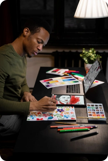 Man, table, laptop